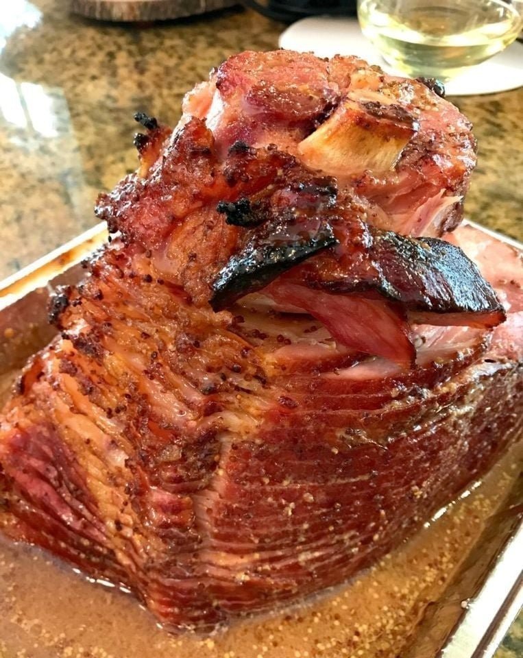 Baked ham, cooked low & slow with brown sugar, mustard, and cola