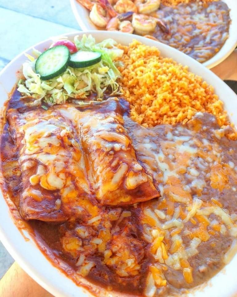 BEEF ENCHILADAS with extra cheese on top