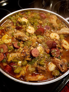 okra stew with chicken, sausage, shrimp and crawfish tails, onion and green peppers￼