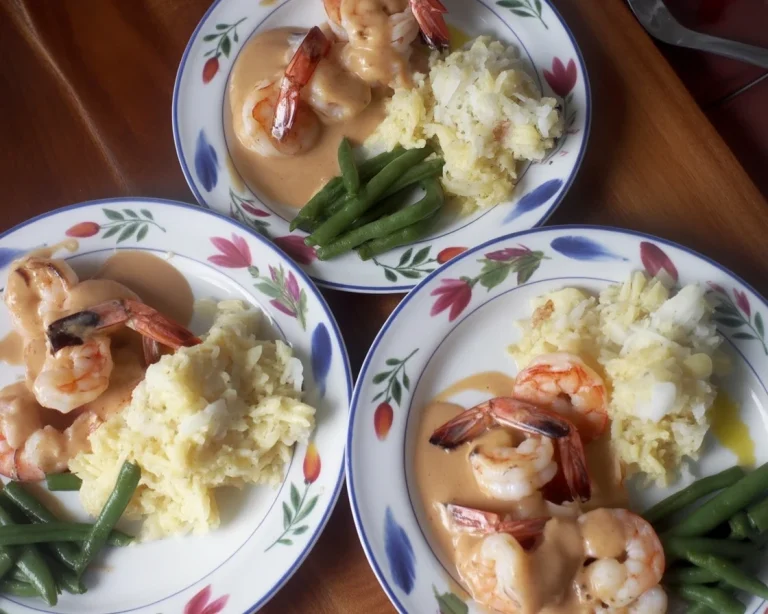 Filet Mignon served with grilled shrimp in a rich creamy sauce.