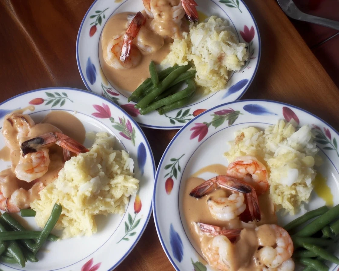 Filet Mignon served with grilled shrimp in a rich creamy sauce.