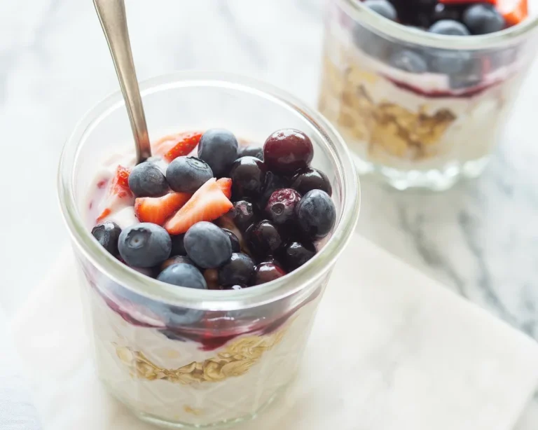 Jar of overnight oats with fruit and toppings for a nutritious breakfast