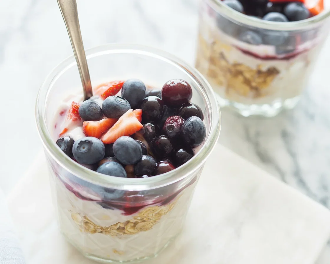 Jar of overnight oats with fruit and toppings for a nutritious breakfast