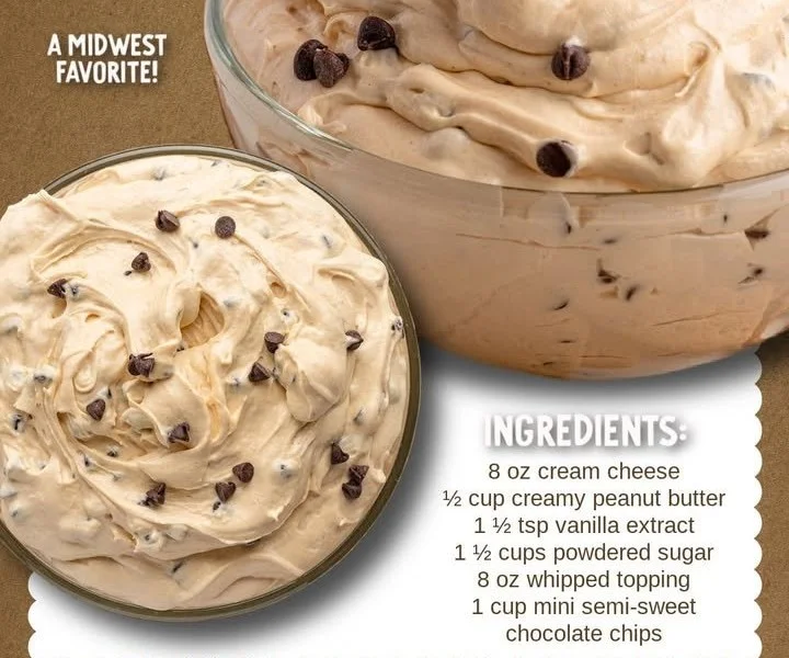 Delicious Buckeye Dip served in a bowl with crackers and fruit