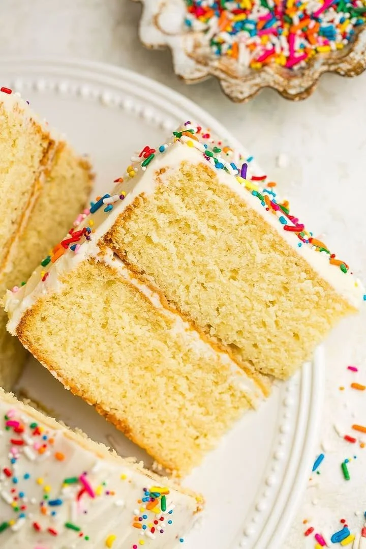 Delicious homemade buttermilk cake topped with fresh berries
