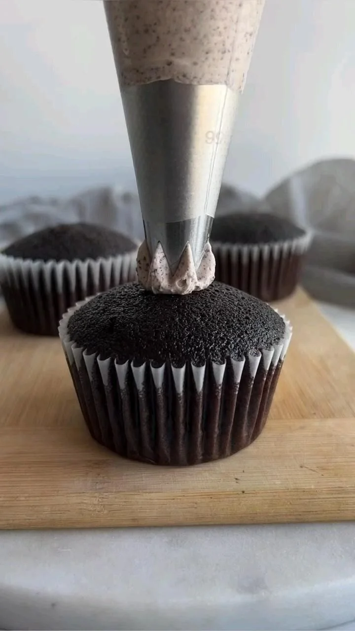 Delicious chocolate cupcakes topped with creamy frosting and sprinkles