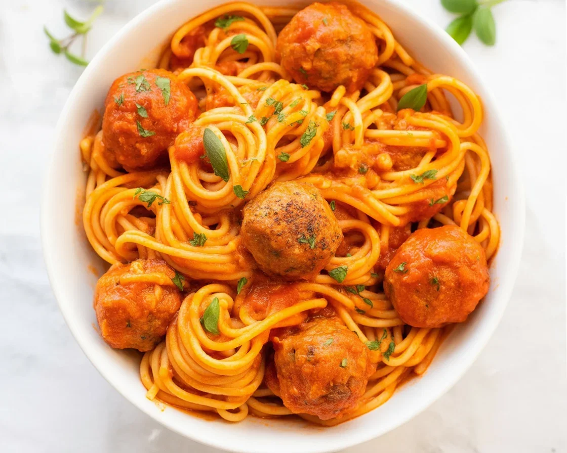 One-Pot Spaghetti with Meatballs served in a deep frying pan, showcasing no mess and full flavor.
