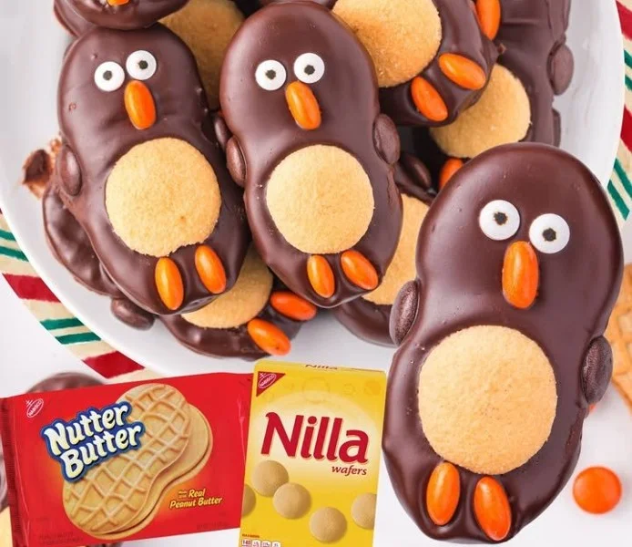 Delicious Peanut Butter Penguins treats on a plate, perfect for snacks.