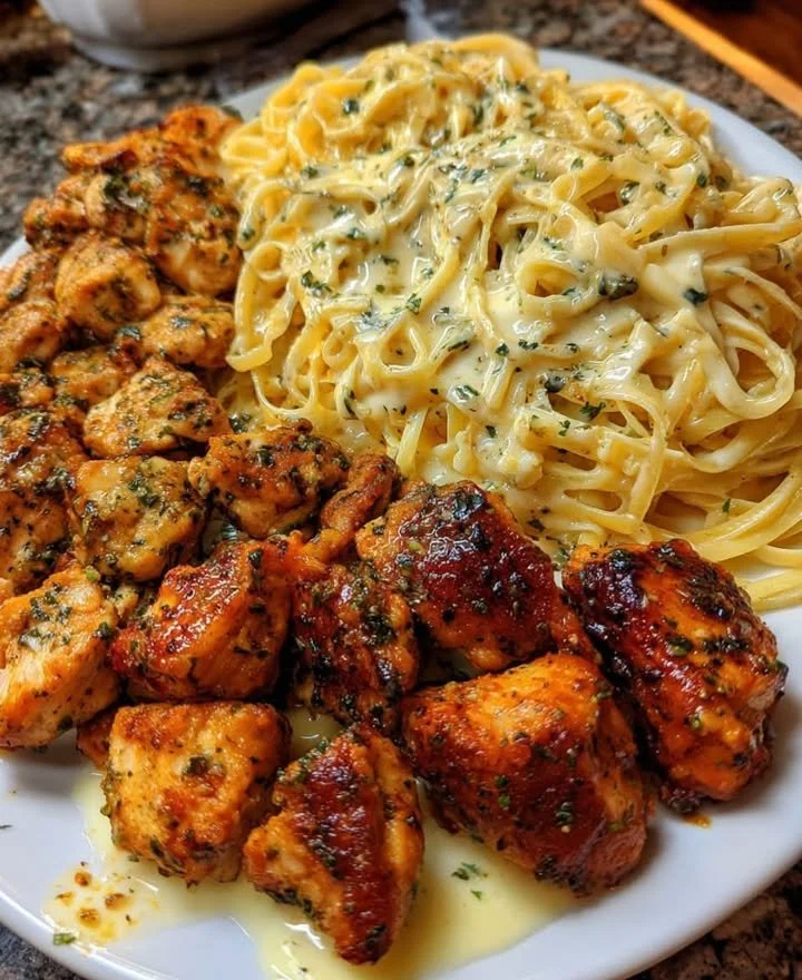 Creamy Cajun Chicken Linguine garnished with herbs in a bowl