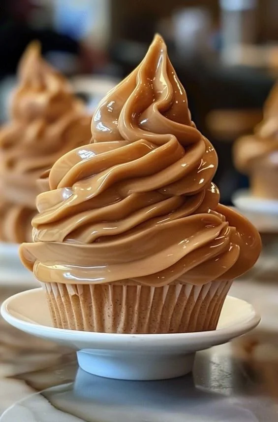 Delicious caramel swirl cupcakes with creamy frosting and caramel drizzle