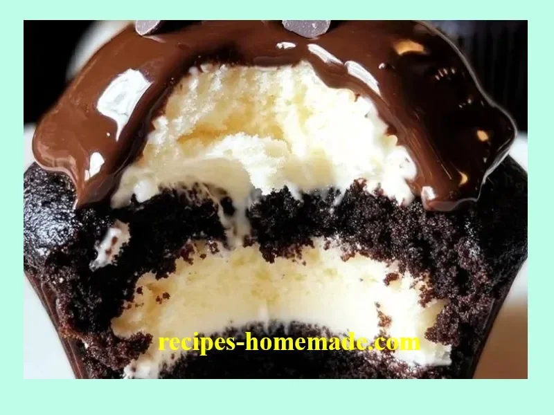 Cheesecake-stuffed chocolate cupcakes topped with creamy frosting