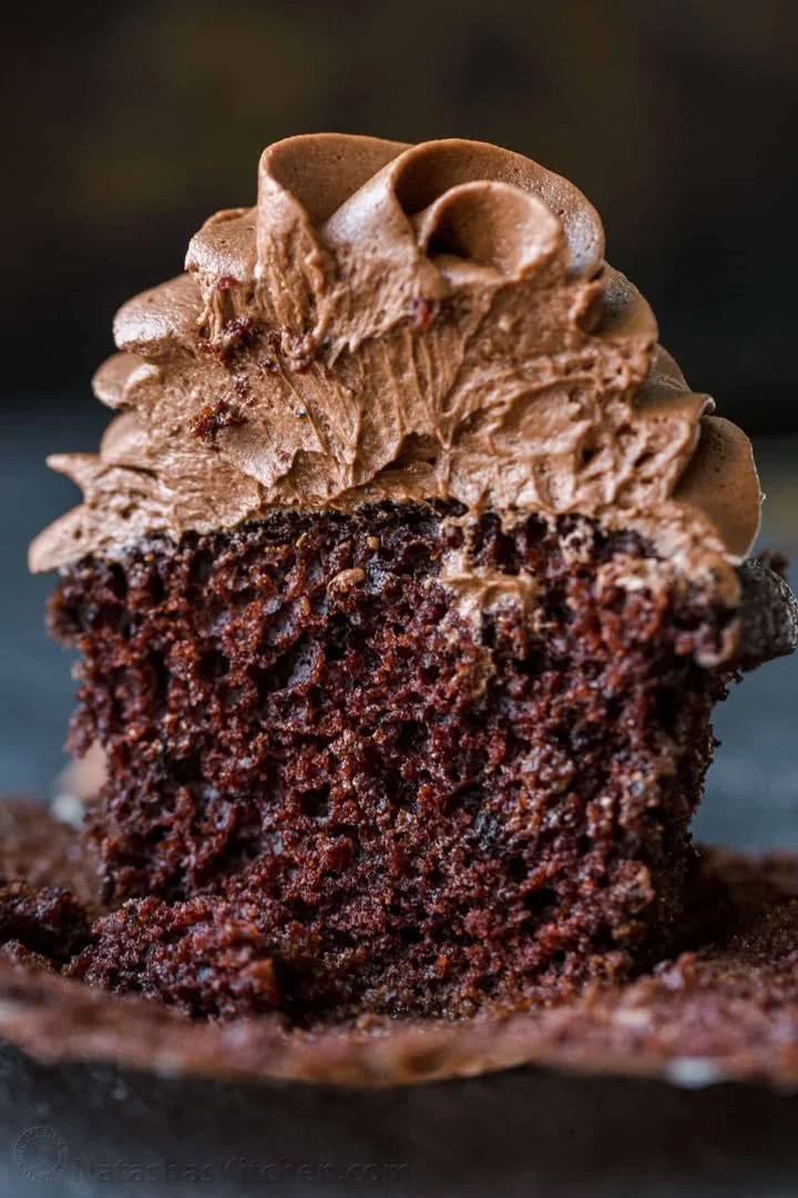 Delicious chocolate cupcakes topped with creamy frosting and sprinkles