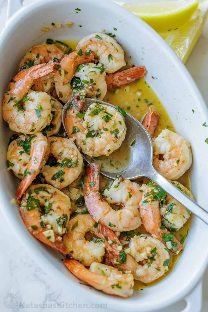 Plate of classic shrimp scampi with garlic, lemon, and parsley