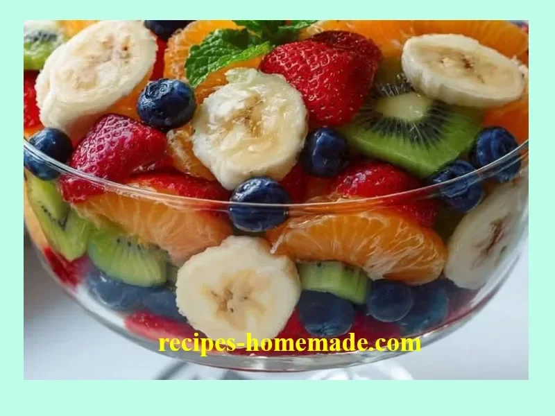Colorful Trifle Fruit Salad with layers of fresh fruits and cream