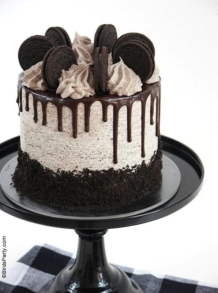 Delicious Cookies & Cream Drip Cake topped with chocolate drizzle and cookies