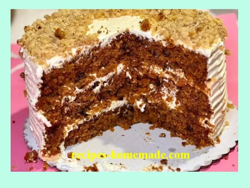 Decadent carrot cake with cream cheese frosting and decorative nuts