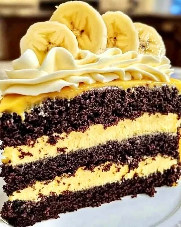 Double Chocolate Banana Layer Cake with chocolate frosting and banana slices