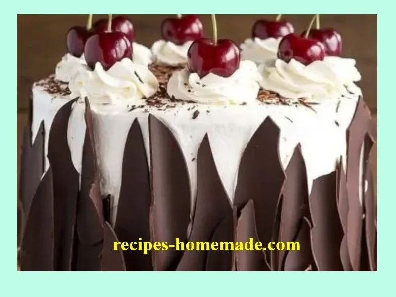 Irresistible Cherry Chocolate Cake with cherries and chocolate frosting