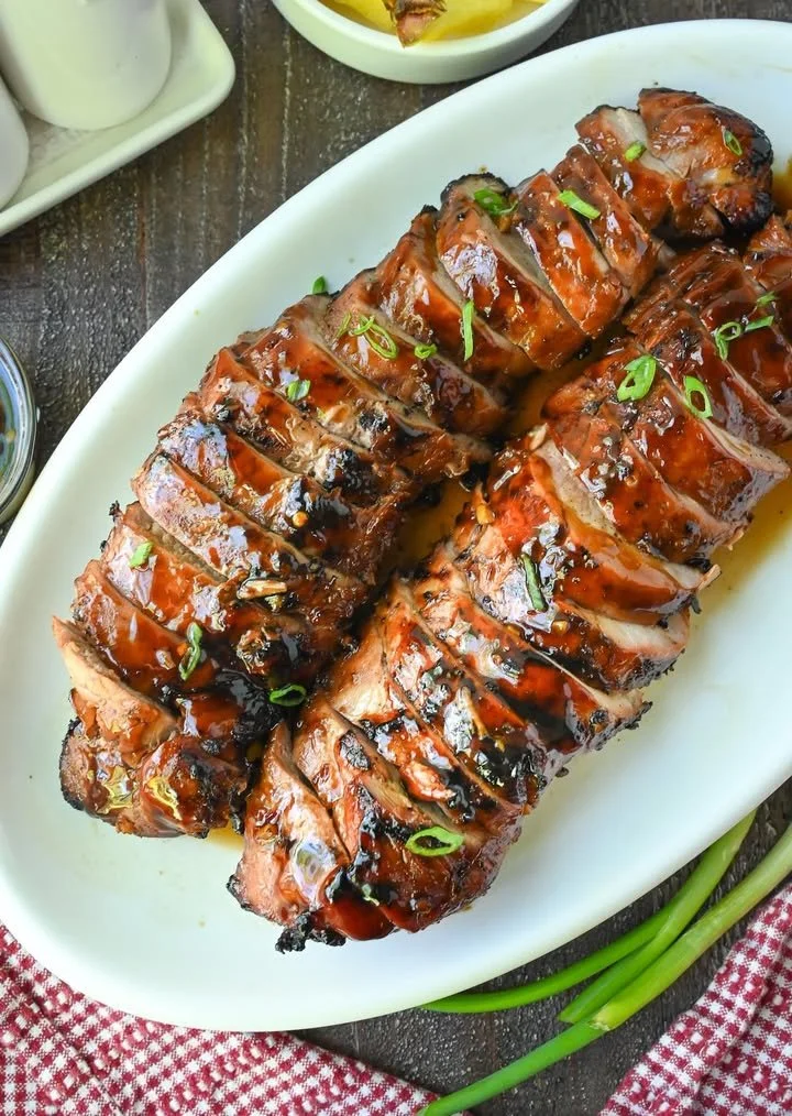 Delicious teriyaki grilled pork tenderloin served with vegetables
