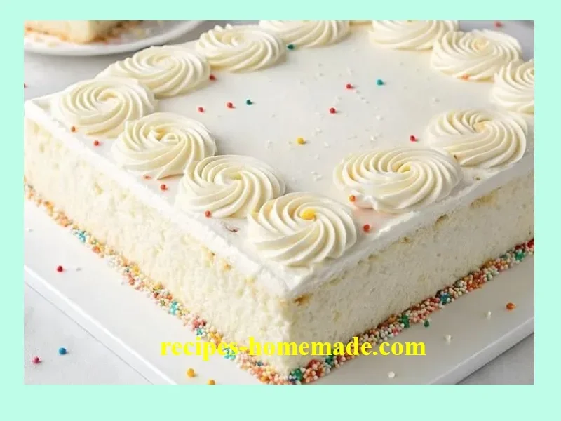 Delicious White Texas Sheet Cake with frosting and decorative toppings