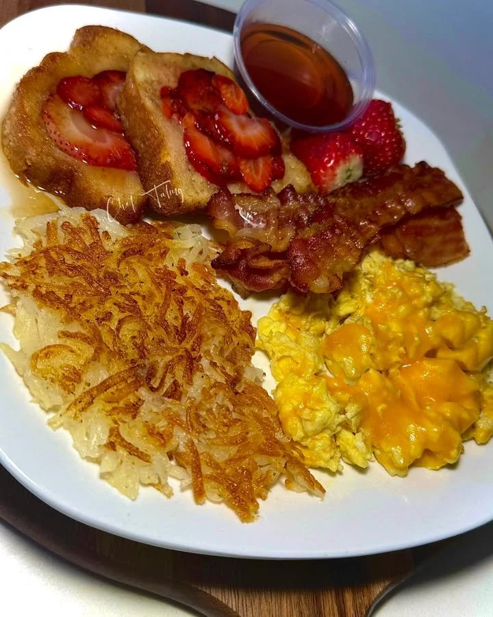 Delicious buttery strawberry pound pancakes topped with fresh strawberries