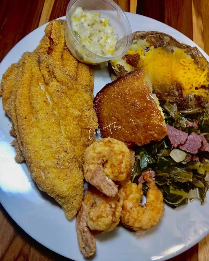 Delicious Catfish & Shrimp dish served with flavorful garnishes