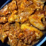 Delicious Chicken Jambalaya served in a bowl with vibrant vegetables and spices.
