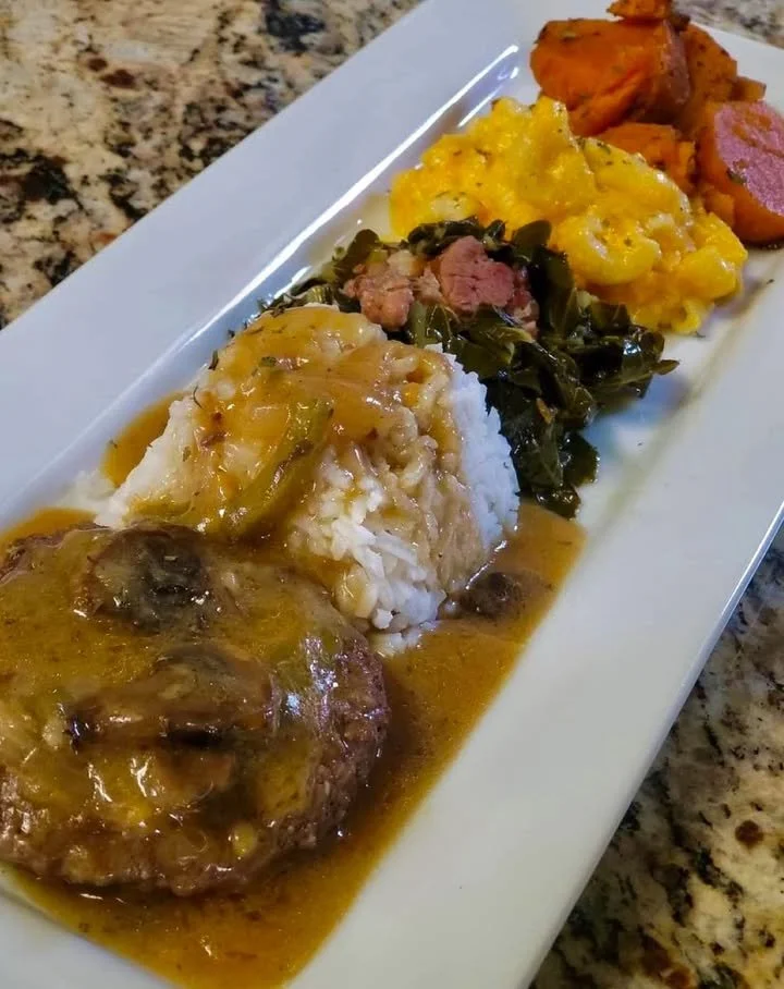 Delicious hamburger steak served with rich mushroom gravy on a plate