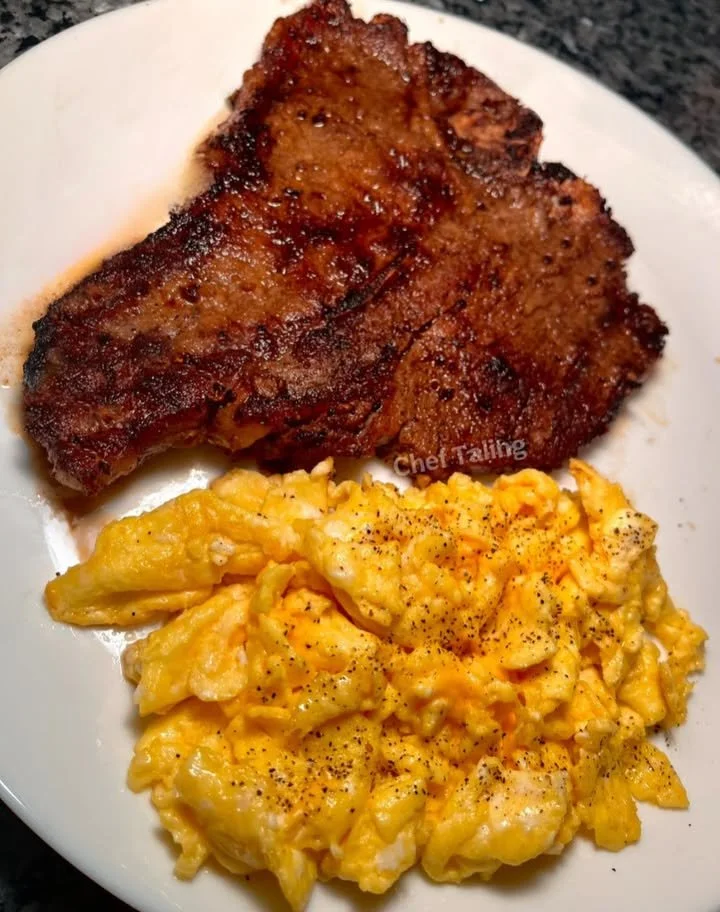 Delicious peppery cheese eggs served with T-bone steak.