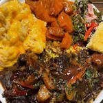 Delicious pot roast served with carrots and potatoes