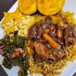 Delicious pot roast with colorful vegetables in a rustic dish
