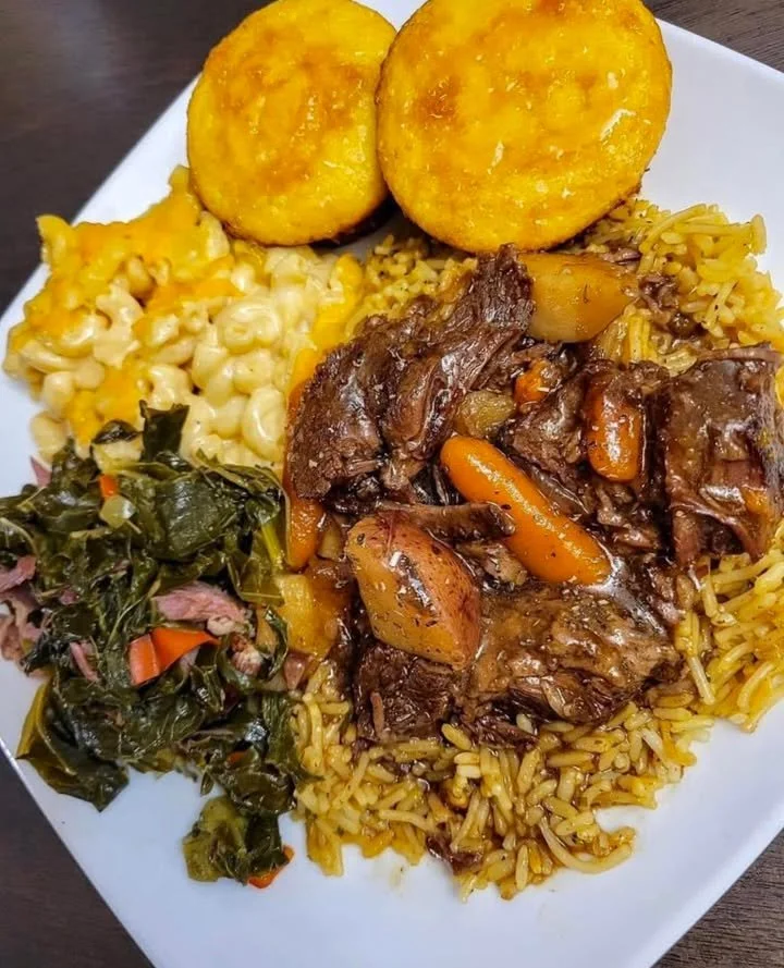 Delicious pot roast with colorful vegetables in a rustic dish