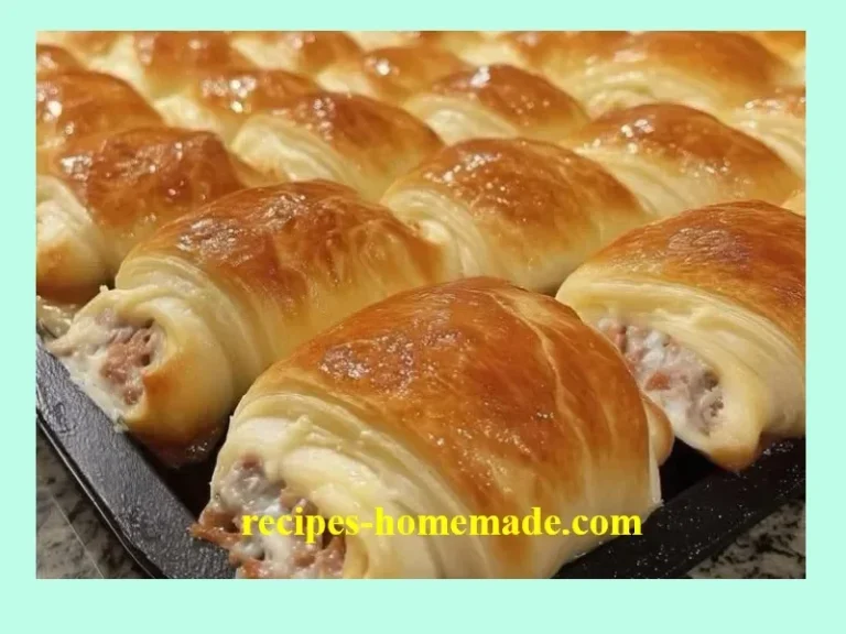 Sausage cream cheese crescent rolls on a serving plate