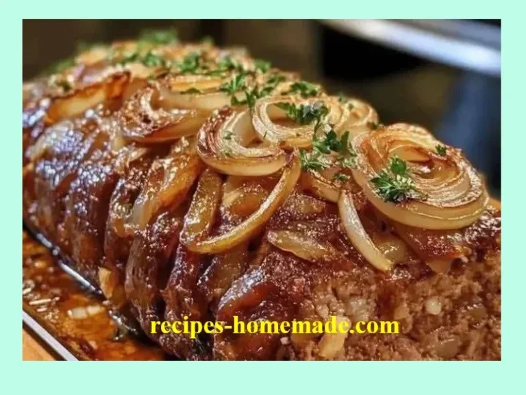 Savory meatloaf served with caramelized onion gravy on a plate