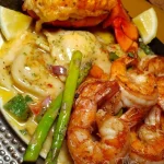 Delicious seafood platter featuring shrimp, crab, and fish for a seafood feast.