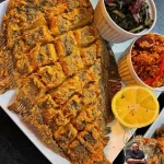 Southern fried flounder served with lemon and tartar sauce
