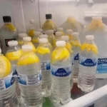 Person expressing dislike for the taste of water during discussion.