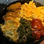 Delicious chicken dinner served on a plate with sides for a perfect meal