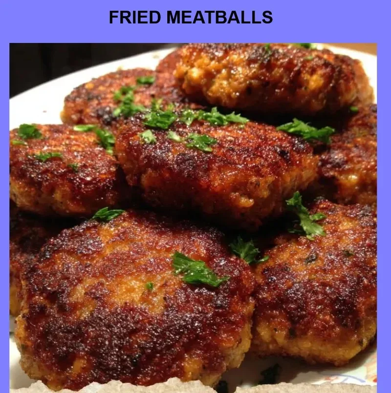 Plate of crispy fried meatballs with dipping sauce