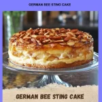 Slice of German Bee Sting Cake with cream and almond topping on a plate