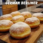 German Berliner Delicious German Berliner pastry filled with sweet jam and powdered sugar.