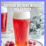 Glass of Berliner Weisse beer with a shot, served in a traditional German style.