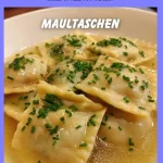 Plate of traditional Maultaschen, delicious filled pasta from Germany.