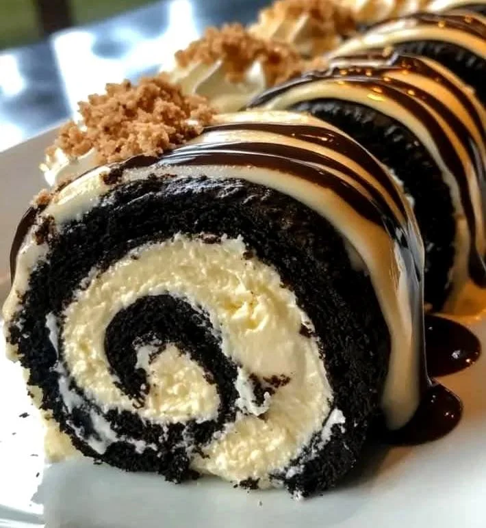 Oreo cheesecake sushi roll with cream cheese and Oreo cookie toppings