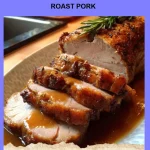 Succulent roast pork with crispy skin and flavorful herbs.