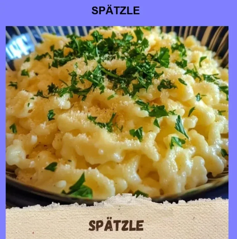 Homemade Spätzle noodles served with sauce and herbs.