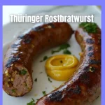 Delicious Thuringian roasted sausage served with traditional sides.
