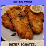 Crispy and golden Viennese Cutlet served with a lemon wedge