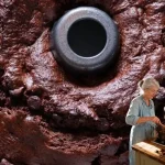 A beautifully decorated cake showcasing layers and frosting, representing the best cake ever.