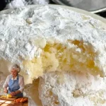 Christmas Powdered Sugar Cookies Delicious Christmas powdered sugar cookies dusted with white sugar on a festive platter